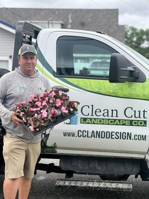 Team member ready to install flowers at a home in Metairie