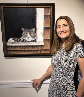 Martine Marie at a local art show exhibiting her oil on canvas animal portrait painting. Website: CAP-Arts.com