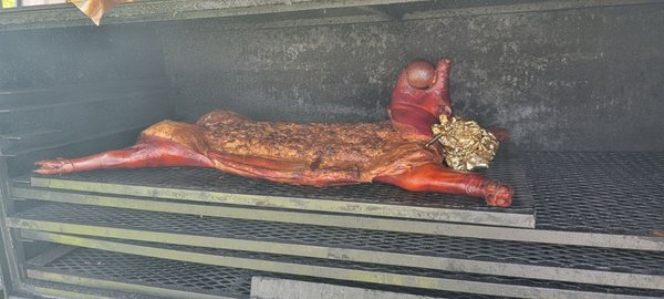 Wonderfully cooked STUFFED pig roast. Cooked to perfection