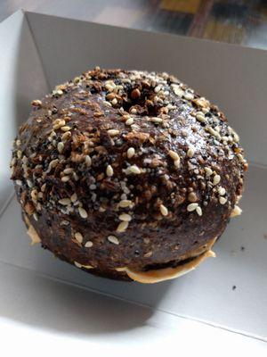 Black Russian bagel with sesame Sriracha cream cheese