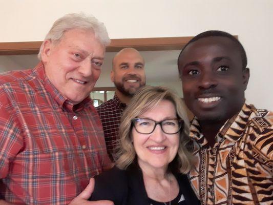 Our President, Rev. Dr. Seth Aidoo, in a cheerful pose with some of our ministry partners and friends.