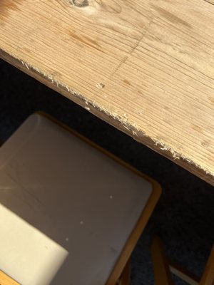 Farm table covered in splinters