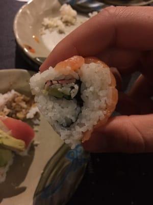 I think that's a hairline sliver of salmon on top? It started to float away before I pinched it. All rice no fish