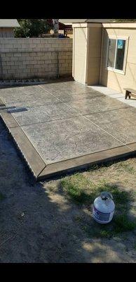 roman slate stamped concrete w/ light broom boarders