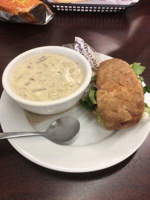 Loaded potato soup and half sandwich