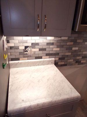 Installed tile backsplash