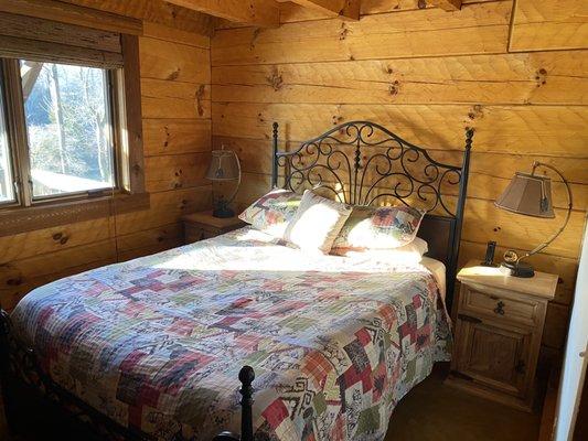 Upstairs loft is nicely appointed with a queen bed.