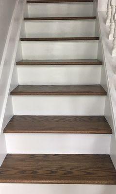 New staircase stained to match our new floors.