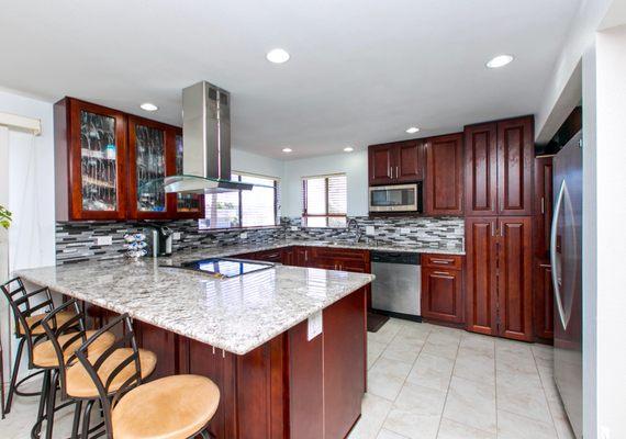 This modern kitchen is located in the West Loch Estates.