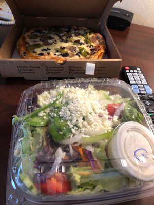 Greek salad and pizza