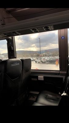 Inside bus, seats.