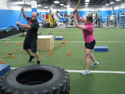 Personal training session getting busy on the tire