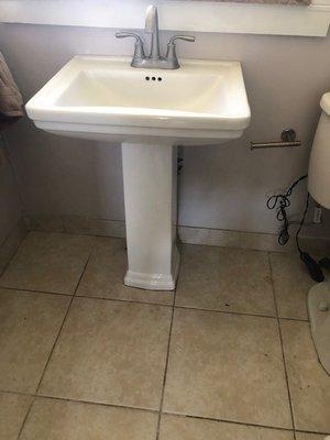 New Pedestal sink Install with New Faucet and supply line + valves.