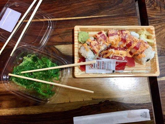 spicy tuna roll and seaweed salad