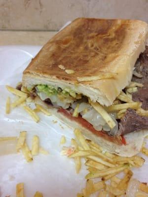 Steak, onion, avocado, tomato, cheese, and pepitas (fries).  So good!!