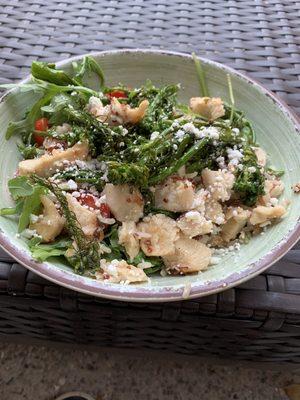 Mediterranean Bowl with broccolini, arugula, chicken, tomatoes, almond slivers, wild rice and goat cheese.