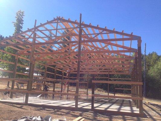 Pole barn construction in process.