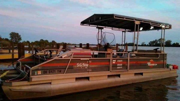 24' pontoon with plenty of room to move around powered by a quiet 115 horse 4 stroke motor.