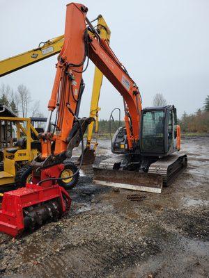 Hitachi 135 and Fecon mulcher.