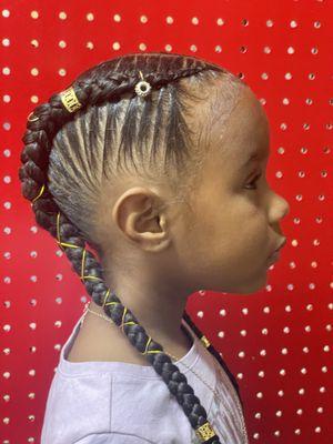 Two goddess French braids with feed in hair . Accessories included in style