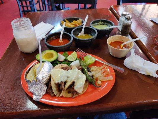 Beef tacos with queso.