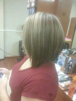 Natural color with highlights and a long bob haircut