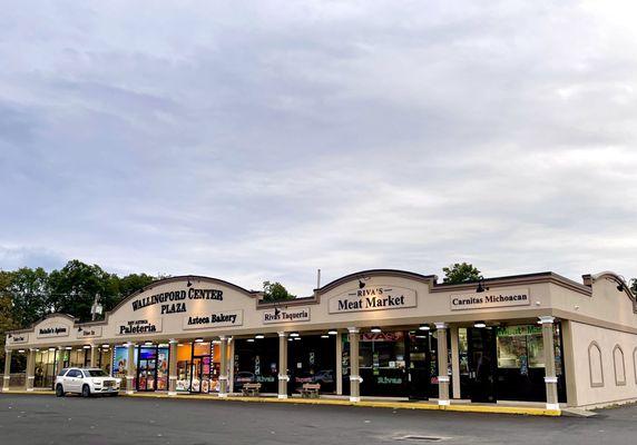 It's in Wallingford center plaza to the left of Aztec bakery