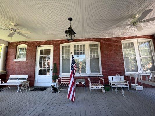 Window cleaning of a home with cut ups, storms, and historic glass.