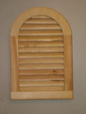 Wood Circle Top (Tombstone) Vent with Brick Trim