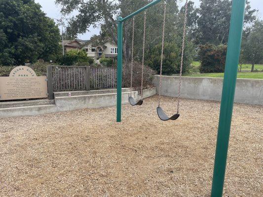 Swings are pretty high up, parents would need to help kids on