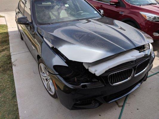 Body work on hood and fender. Bumper painted