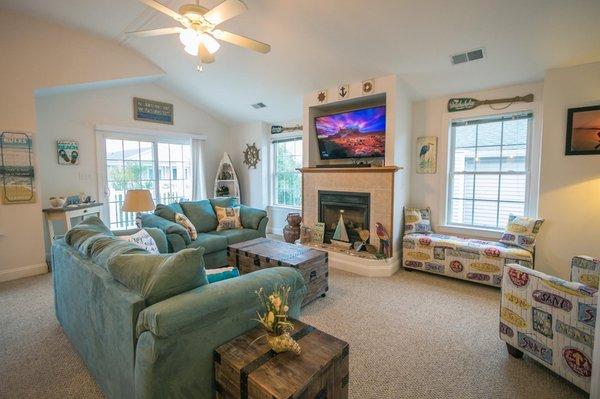 Living room with sleeper sofa. 55" flat screen Smartv with expanded cable and Netflix