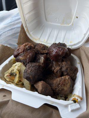 Small jerk pork and cabbage plate..