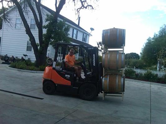 Abe moving the wine barrels