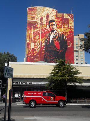 Mural with a different fire truck in foreground