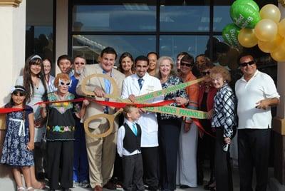 Ribbon cutting ceremony. Welcome to our store!