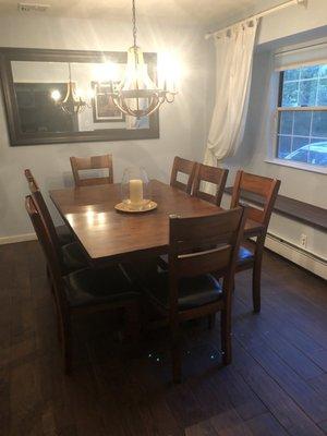 Dinning room - glass wood and chandelier cleaned to perfection.