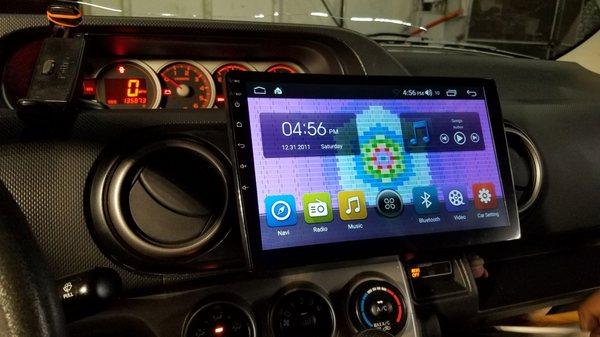 Factory radio upgraded to a 10inch radio w/Android Auto and Apple CarPlay.