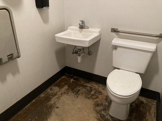 Spotless bathroom with changing table.