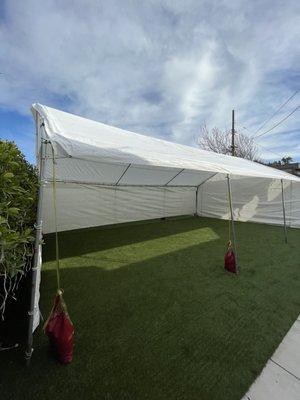 Tent with walls and weights