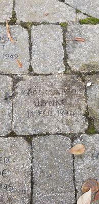 Brick engraved with name of Conrad J. Wynne, a former Chicago Fire Captain, who died on February 14, 1946