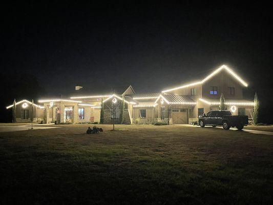 Warm white Christmas lights we provided and installed!