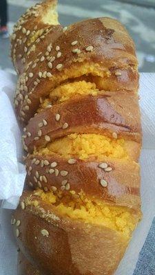 $0.75 for this sesame bread twisted with sweet Mexican bread stuff. DELICIOUS!