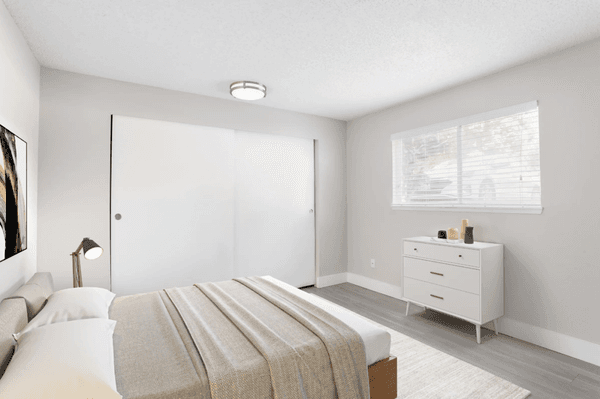 Bedroom With Window And Closet