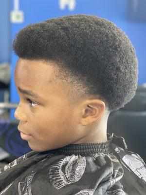 Kids taper shadow fade with line up .