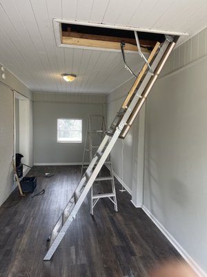 Showing the install of attic stairs