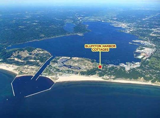 2 1/2 blocks to Lake Michigan sandy beach (bottom). 1 block to Muskegon Lake (top).