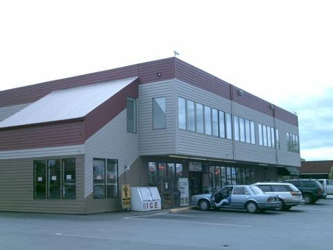 Post office is inside of the market at the shell station.