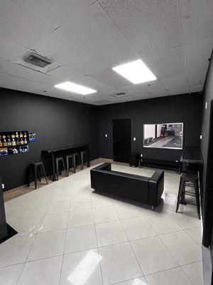 Front Lobby with couch and seating with view of classes.