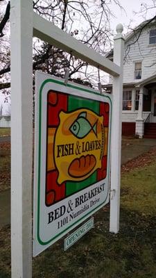 Fish & Loaves logo street signage.